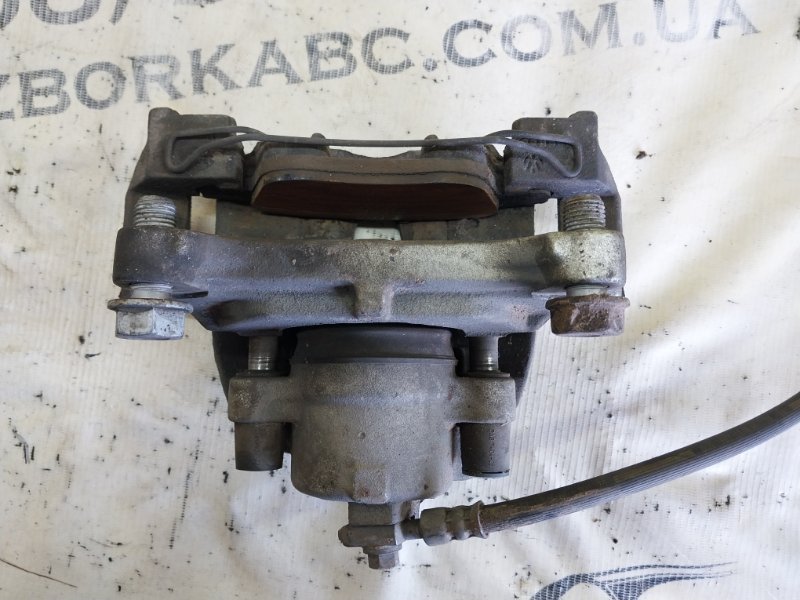 Суппорт тормозной передний левый passat 2014 B7 2.0
