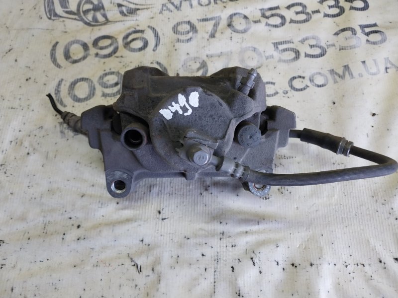 Суппорт тормозной передний правый passat 2014 B7 2.0