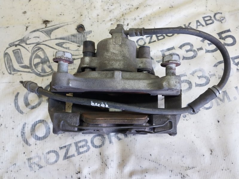 Суппорт тормозной передний правый volkswagen passat B7 2.0